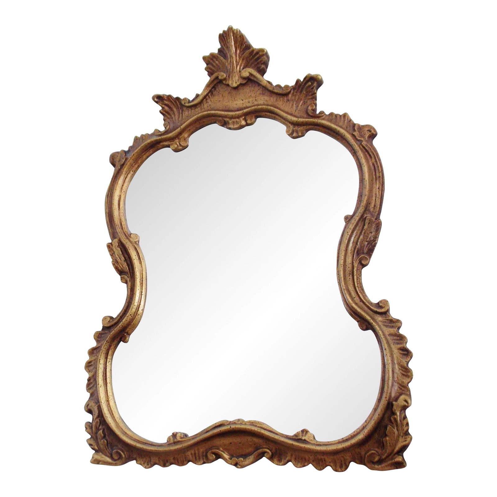 1980s French Style Gilded Mirror: French style small gilded accent mirror with leaf motif on crest and scrolled design on frame. No makers mark. Condition: Alterations: Original Condition Unaltered Imperfections: Some Imperfections