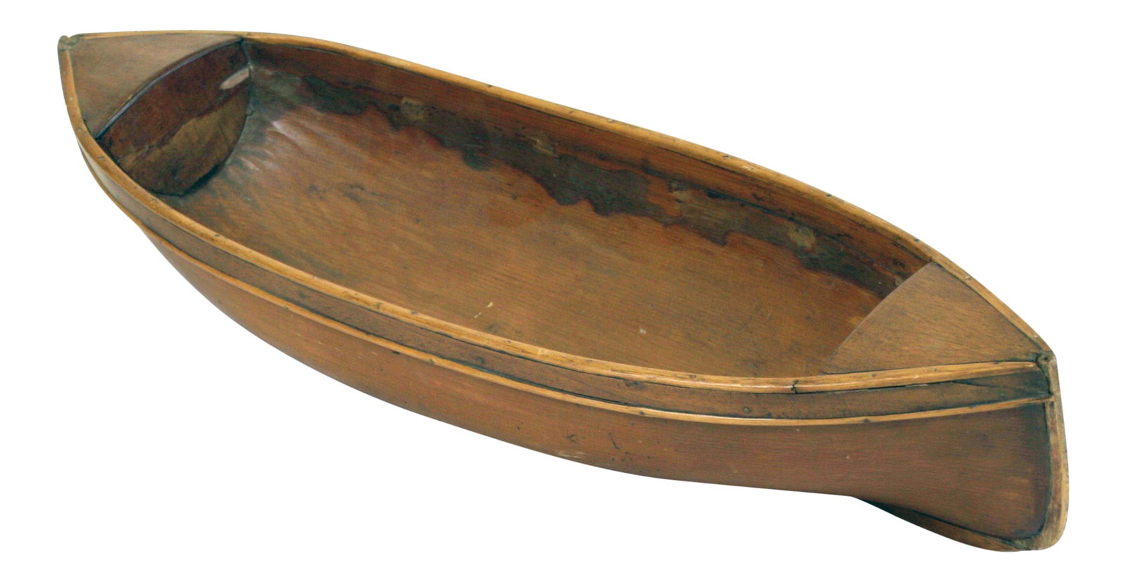 American Wooden Decorative Canoe: Wooden Mid-Century Canoe. Crafted from wood, this free standing model of a traditional American canoe is a richly hued golden brown with a semi-gloss finish. It has the look a a beloved antique