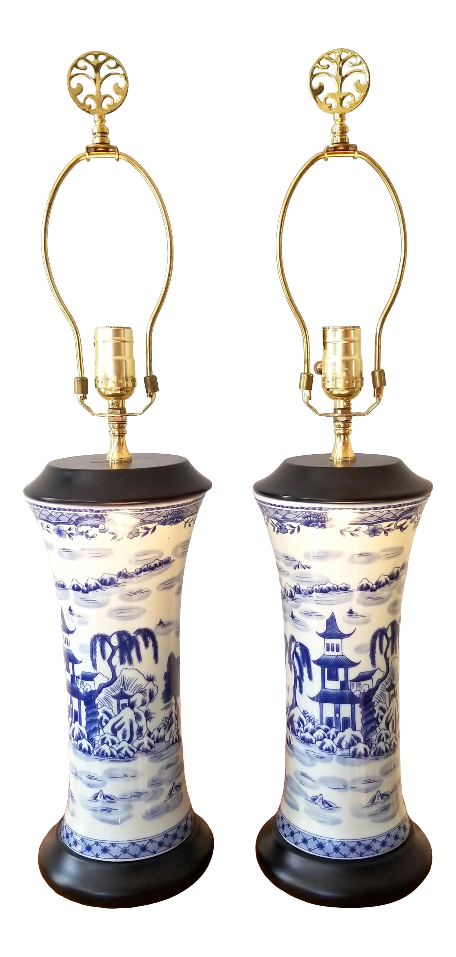 Late 20th Century Asian Brush Pot Blue and White Lamps - a Pair: Wonderful pair of blue and white Asian lamps, presented in a Chinoiserie pattern very similar to a classic blue willow pattern. The cylindrical shaped ceramic lamps have the shape of a tall brush