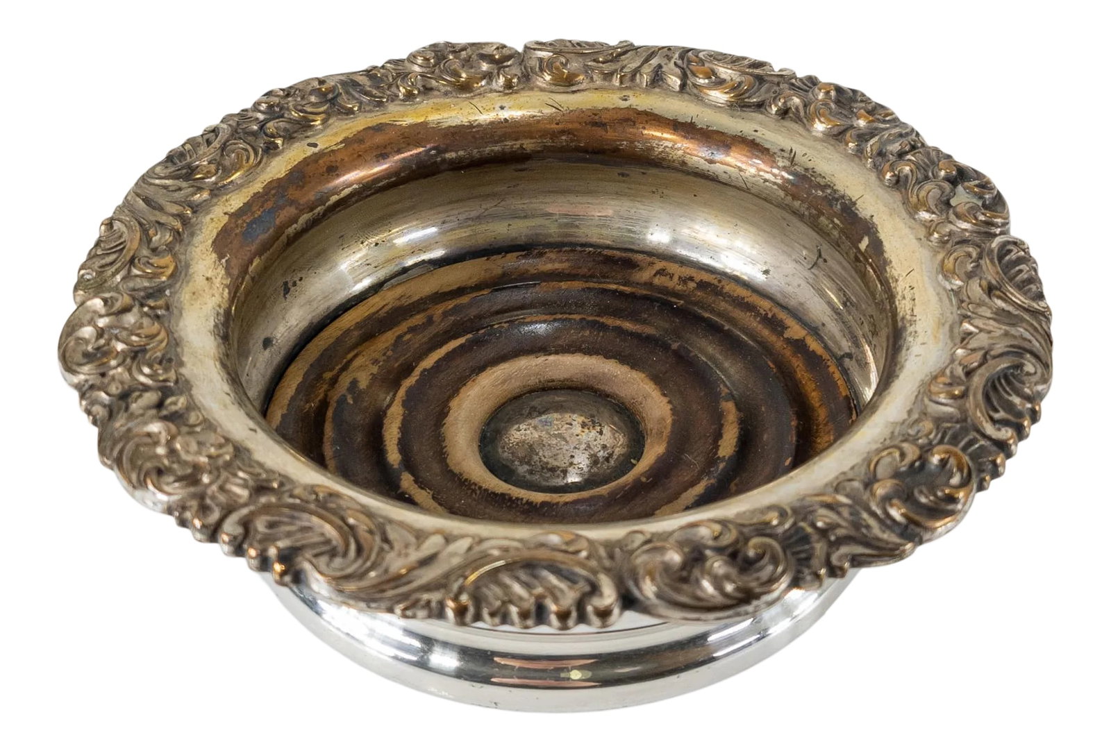 Late 19th Century English Sheffield Silver Plate Wine Coaster: We are selling this English Sheffield silver plate on copper wine coaster with Victorian style, probably late 19th or early 20th century. Will hold a wine bottle up to just about 4 1/4 inches in