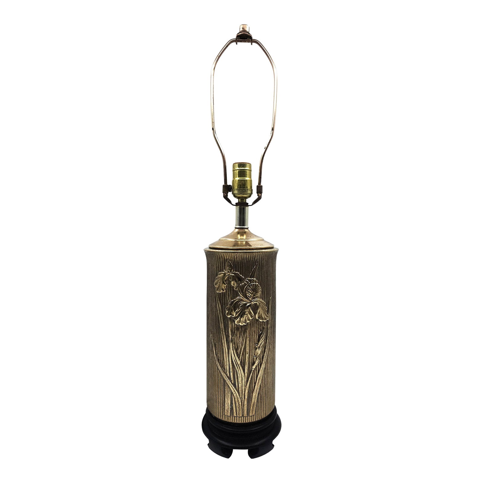 Vintage Brass Iris Relief Table Lamp With Wood Base: Illuminate your space with this elegant vintage brass table lamp featuring a beautifully detailed iris floral relief motif in raised sculptural form. The lamp's fluted brass body showcases refined cra