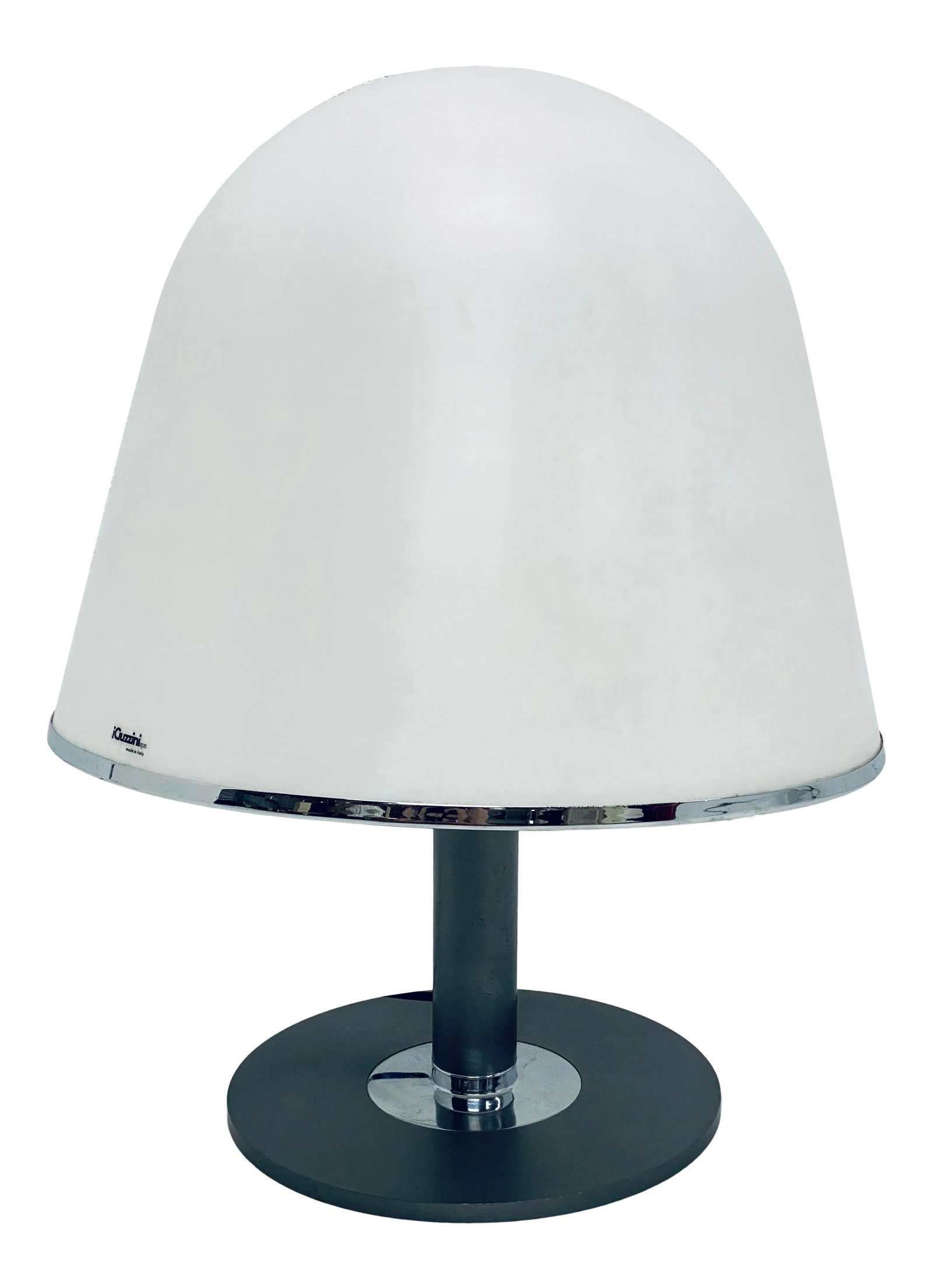 Franco Bresciani Kuala Table Lamp for Guzzini, Italy 1970s: Mid-Century Kuala desk or table lamp made of a matte white molded plastic dome shade on a gunmetal and polished steel base designed by Franco Bresciani for iGuzzini. Wired for USA. Condition: Alterati