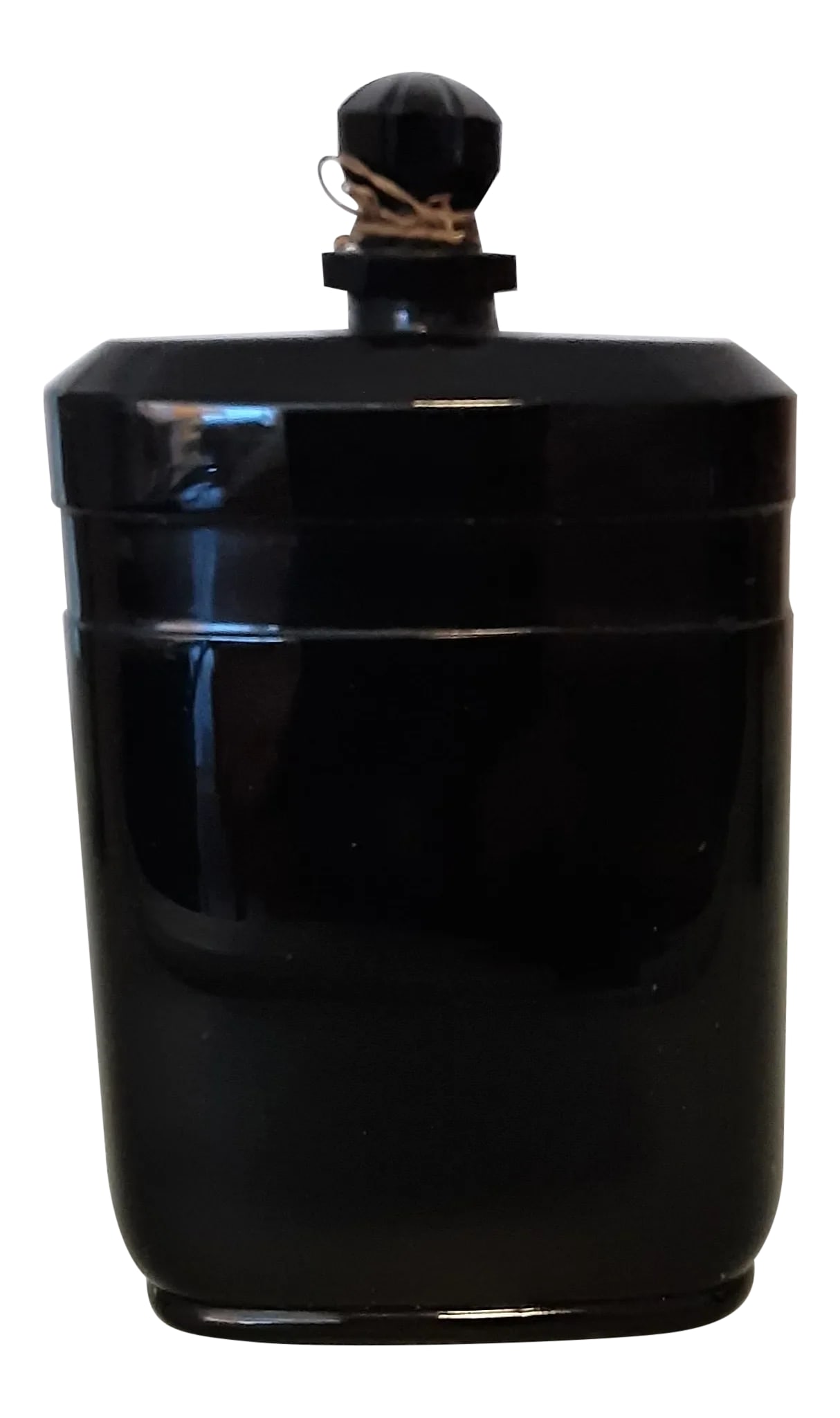 1930s Black Glass Perfume Bottle Nuit De Noel by Caron: Approx 4" French Art Deco rectangular opaque black glass perfume bottle (NUIT DE NOEL by CARON) without a gold band but with a round, faceted stopper Measurements: 2.5" w x 0.75" d x 4.25" h Numbered