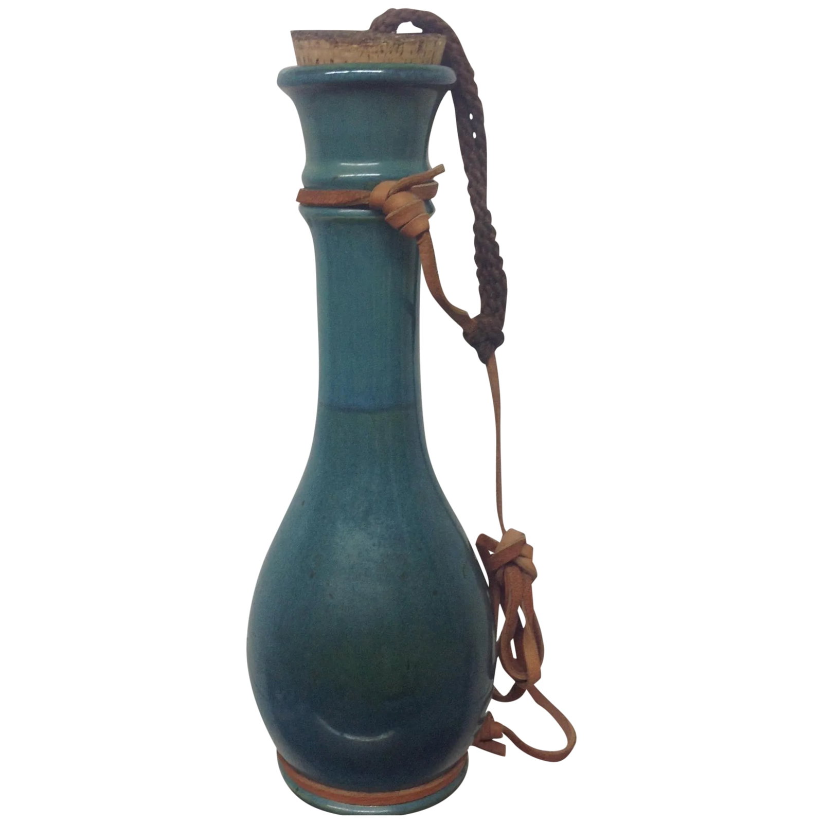 John Conner Blue Art Pottery Tethered Flask: Offered is a John Conner blue art pottery tethered flask. The vessel is finished in a blue green drip glaze with a leather strap and a cork. We ALWAYS accept reasonable offers. Before it's gone