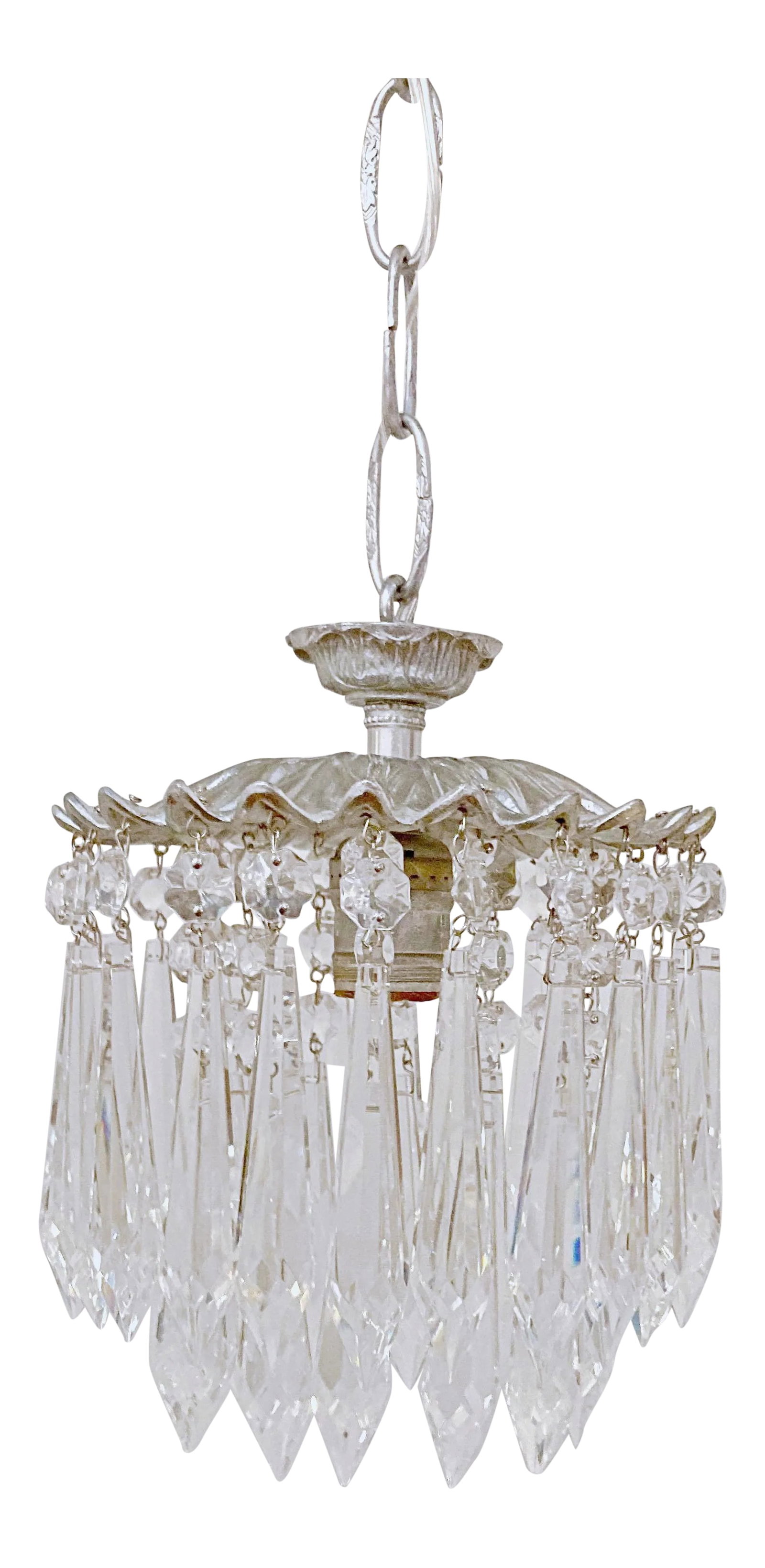 1950s Italian Silver Upside Down Layered Cake Chandelier: Italian layered chandelier with Silver rim, octagon bead chains and 30% leaded U-drop crystals. It has 1 Edison base socket that each can hold up to 100W each. Rewired and restored. #227 Condition: Al