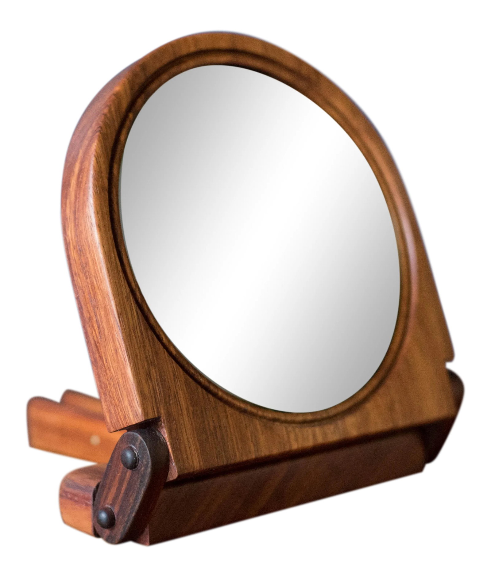 Vintage Studio Koa Wood Foldable Mirror: Mid century round foldable mirror with adjustable stand in koa wood. This versatile hand crafted piece is compact in size and can used as a table or small vanity mirror. Mirror 5" diameter Fully exten