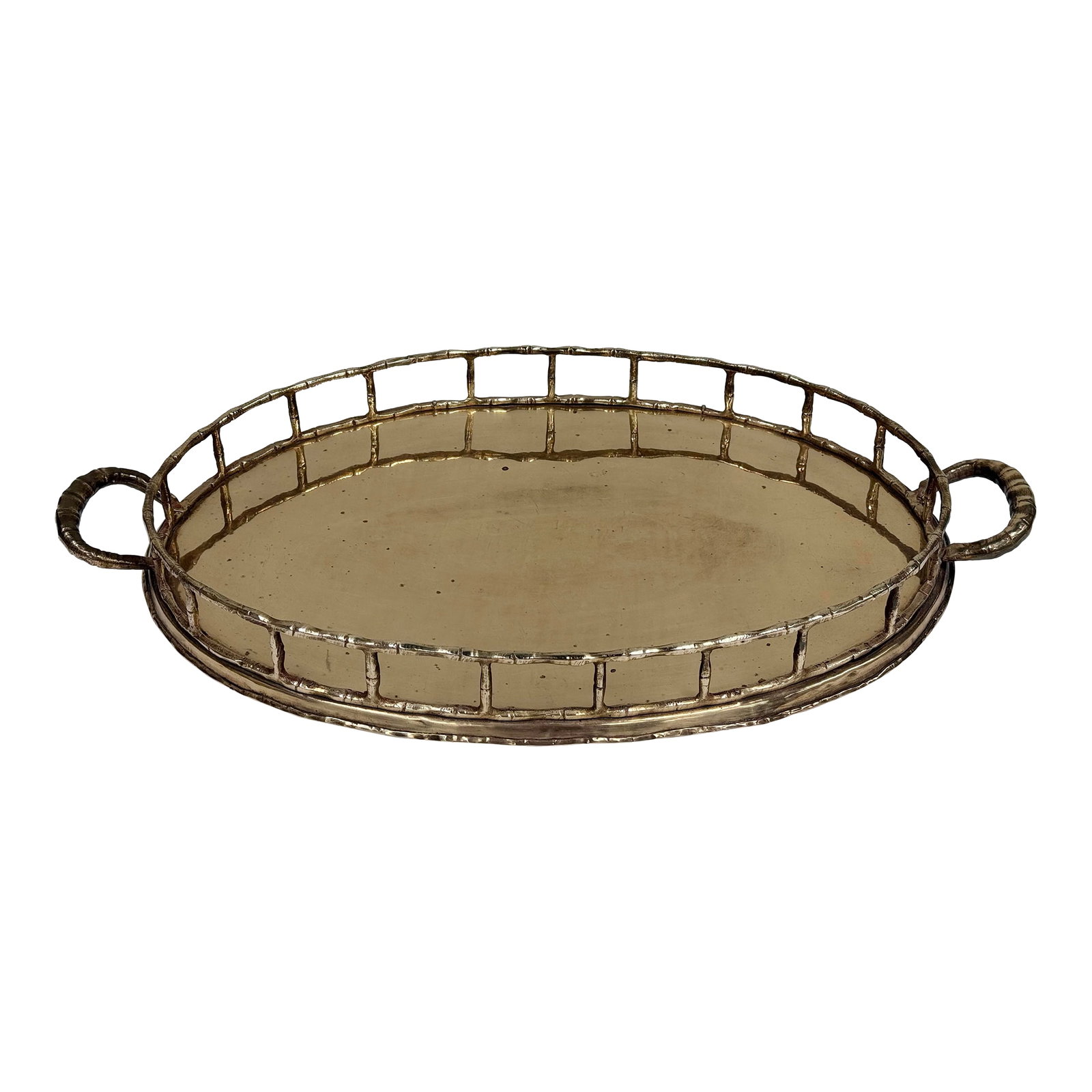 Vintage Oval Brass Faux Bamboo Gallery Rail Tray: Large vintage brass gallery tray featuring faux bamboo detail to rail and handles. Classic oval shape. Lovely patina. Condition: Alterations: Original Condition Unaltered Imperfections: Some Imperfect