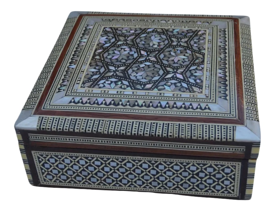 Vintage Moorish Mother-Of-Pearl Inlaid Box: Vintage exquisitely handcrafted mother-of-pearl inlaid Cedar wood box. Features an intricate display of fibulas for protection, astral symbols, and arabesque designs exhibiting an ornate marquetry art