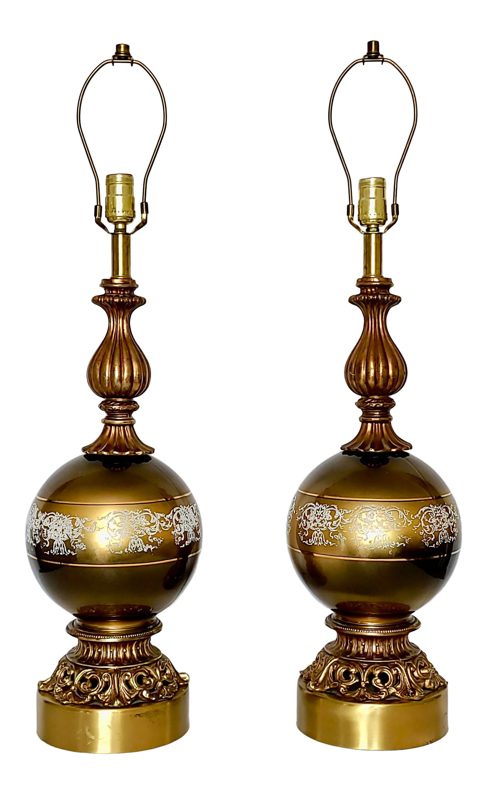 1950s Hollywood Regency Gold Satin Glass Cornell Table Lamps - a Pair: A lovely and authentic vintage pair of Hollywood Regency lamps in gold, satin glass. Lacy, white applique embossing gives it a real Old Hollywood glam feel. Metal trim is a slightly deeper, coppery sh