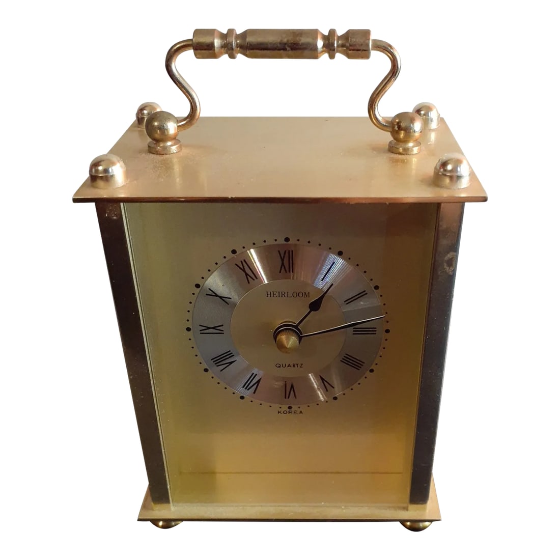 1970s Heirloom Brass Mantle or Desk Quartz Clock: This is a Heirloom Brass 4"x3" Mantle or Desk Quartz Clock Procured at an auction Chairish sells electronic items only with the display as the intended use. The electronic elements are not guaranteed 