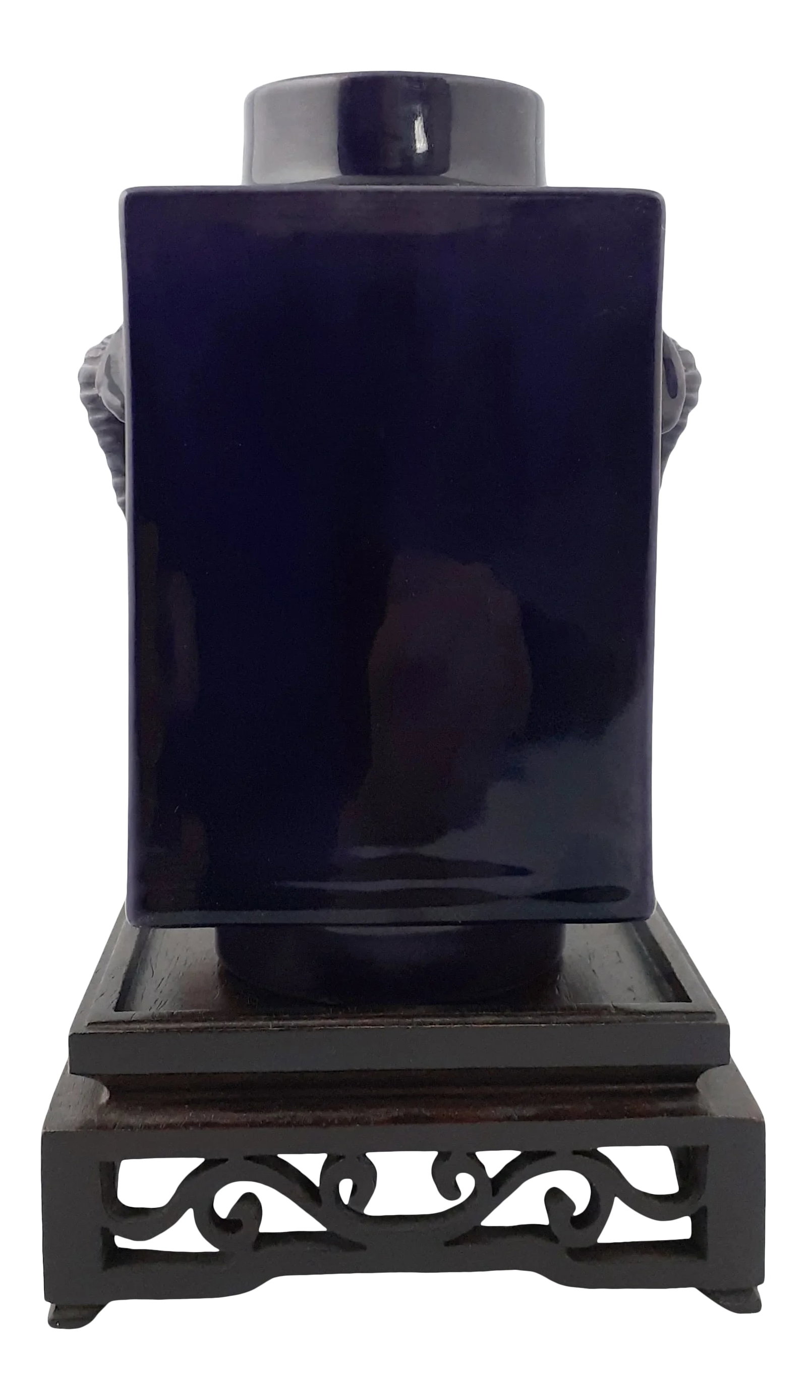 Chinese Porcelain Purple Elphant Head Cong: Chinese porcelain purple elephant head cong, a square form vase with a circular neck and foot, with a deep purple glazed interior, exterior and inset base . Two elephant head handles are finely carved