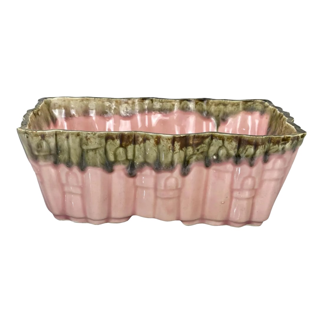 Mid-Century Pink Drip Porcelain Lock Motif Planter by Upco: A Pink Drip Porcelain Planter by Upco, United States, c.1960. This Quaint Sized Planter would look exceptional while displayed in an array of interior styles. The pink base color is accompanied by an