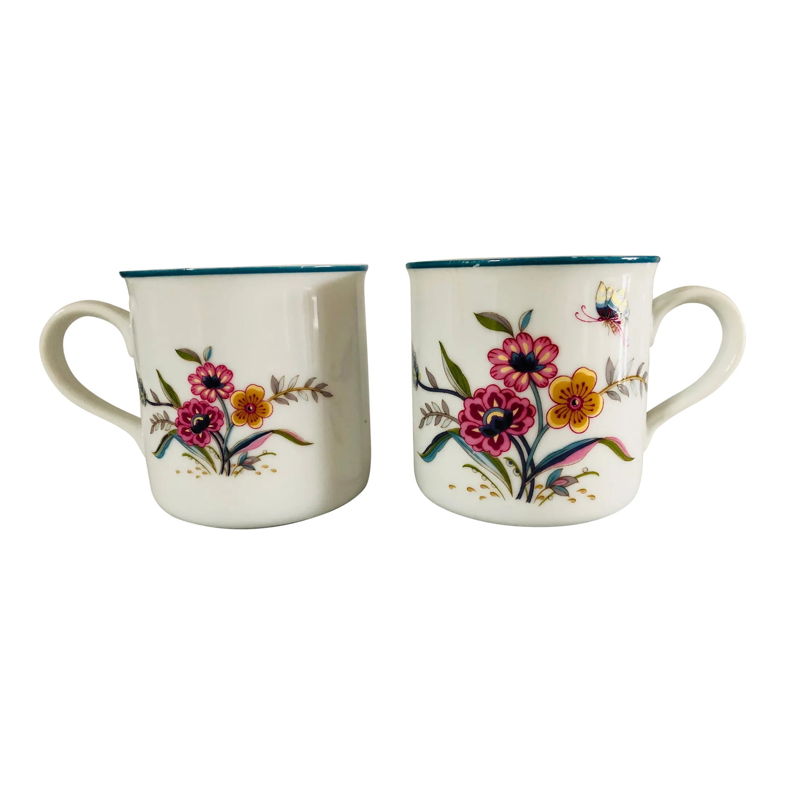 Vintage Floral Design Porcelain Coffee & Tea Mugs S/2: Vintage set of 2 floral and butterfly design porcelain coffee or tea mugs , no makers mark in excellent condition. 3.25"D X 3.5" H Condition: Alterations: Original Condition Unaltered Imperfections: