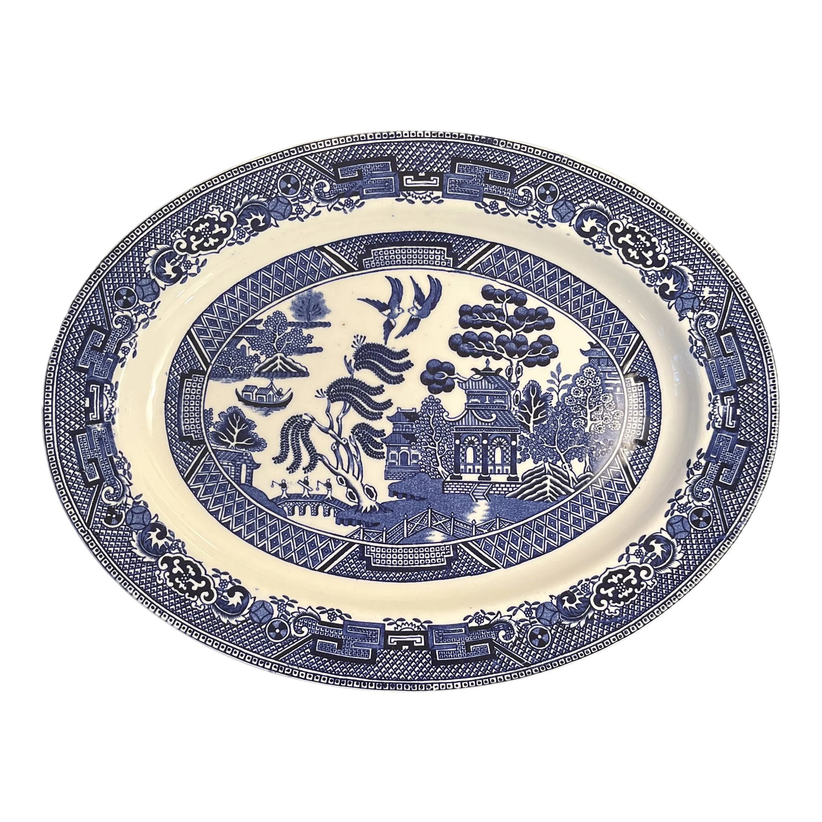 Vintage Blue "Willow" Oval Serving Dish Made in England: Blue " Willow" Vintage oval serving dish. Made in England. Has an identifying hallmark of a rope with the words "Willow" and "England on the bottom (see photo). Number 533 imprinted on the bottom.