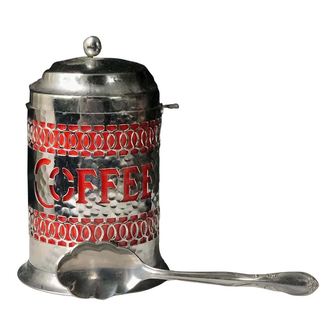 Late 20th Century English Silver Reticulated Coffee Tin: Reticulated and engraved unmarked Coffee storage with lid and insert in excellent condition. Scalloped scooping or stirring spoon. A sweet set to add character to your morning routine. 5" tall x 4" di