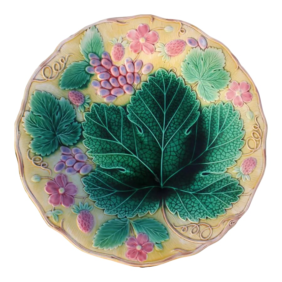 1930s Wedgwood Majolica Strawberries and Leaves Plate: This is one of my absolute favorite Wedgwood majolica patterns. The background is a warm yellow, and the grapes and strawberries are rendered in pink. The deep green of the leaves is so richly