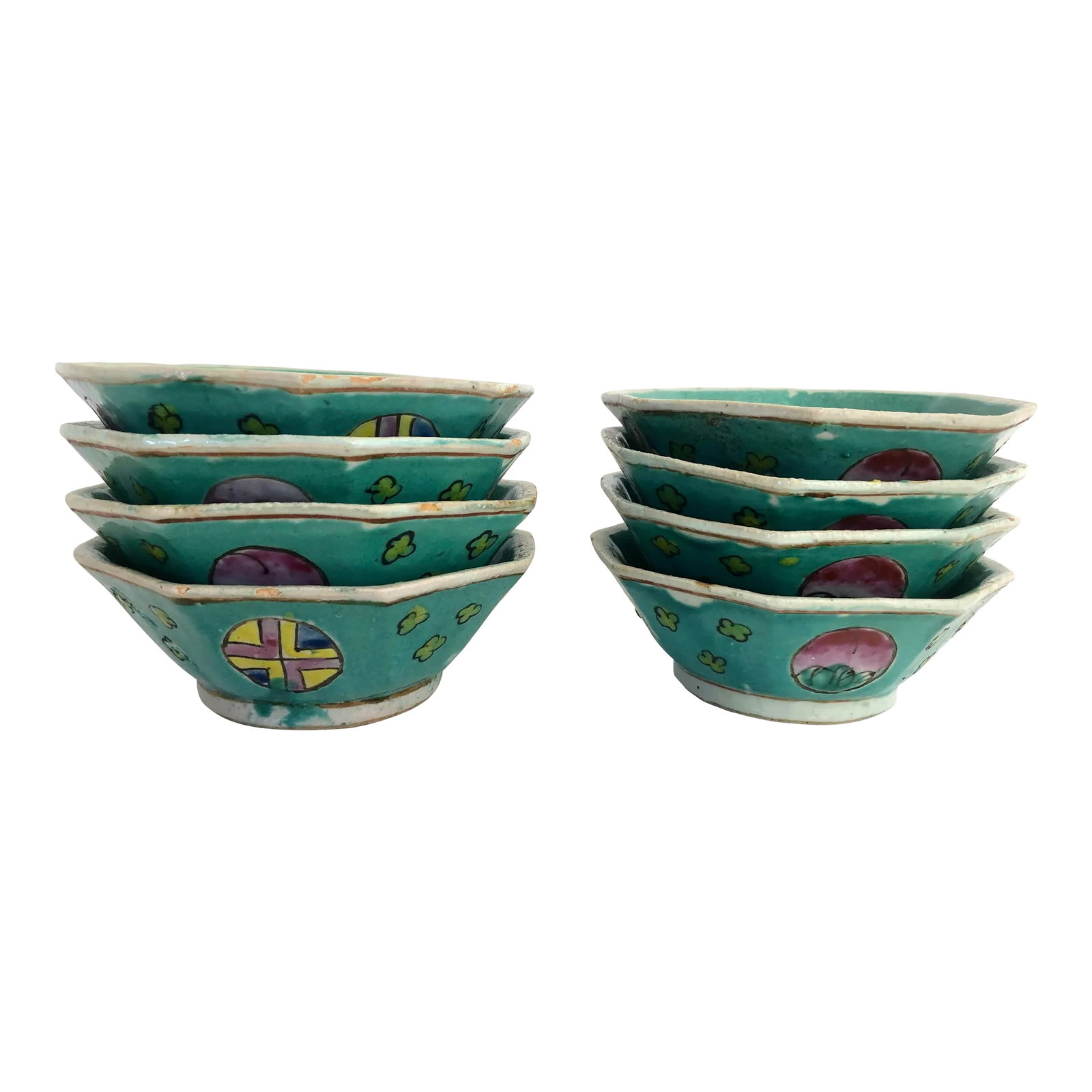 Export Chinese Octagon Rice Bowls, Set of 8: Set of 8 hand made Chinese rice bowls from the early 20th century have an octagon bowl with a variety of round designs on the outside and raised on a circular footing. Condition: Alterations: