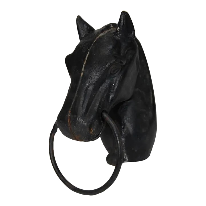 Early 20th Century Black Horse Cast Iron Newel Post With Hitching Ring: An antique horse head cast iron newel post with a ring. One of many equestrian treasures discovered at a Virginia horse farm. I Would have loved to have seen the fence or gate this was once a part