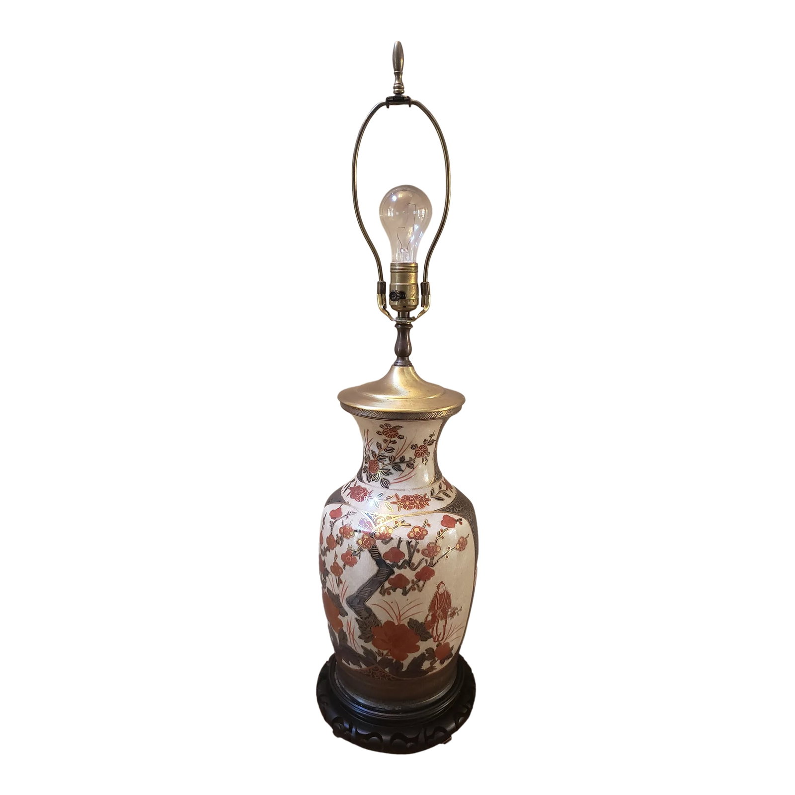 Vintage Mid 20th Century Hand Painted Asian Vase Mounted as Table Lamp: A very pretty Asian hand painted vase in the great Imari colors of Iron Red and Blue. Mounted on a typical ebonized asian base Condition: Alterations: Original Condition Unaltered Imperfections: Some 