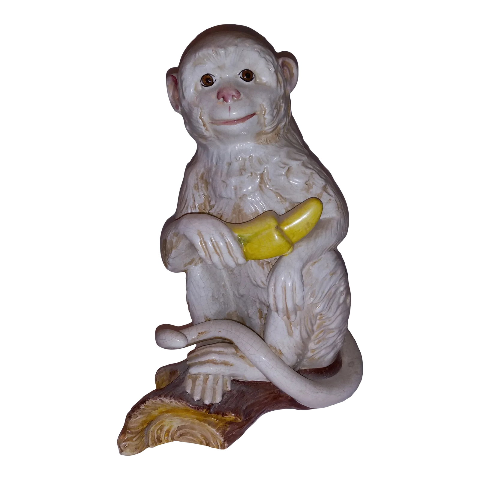 2000s Ceramic Italian Monkey With Banana Crackle Finish Sculpture Offered by Antoinette: Ceramic Italian Monkey with banana crackle finish Sculpture offered by Antoinette. It is a lovely piece that has a smiling happy monkey holding his banana. Made in Italy. Condition: Alterations: