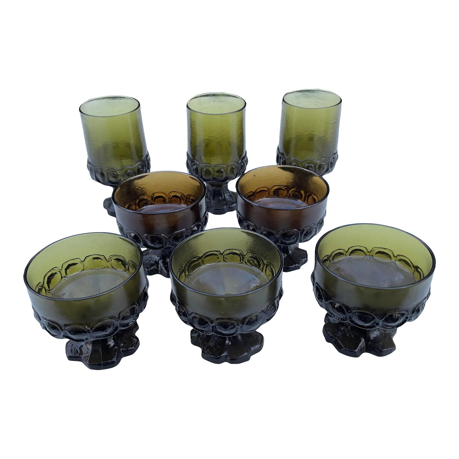 Mid-Century Green and Amber Franciscan Glassware- Set of 8: Set of eight Franciscan ware glasses, three tall and five short. All glasses are in excellent shape with no chips or cracks. Spanish revival style. Measurements are for the tall glasses. Condition: