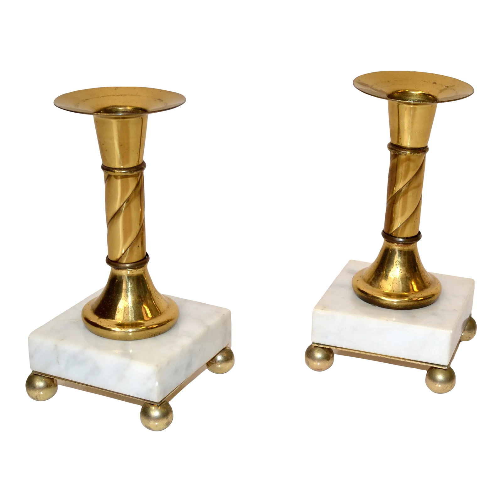 Pair of French Neoclassical Brass White Marble Candle Holder 1950s: 1950s French Neoclassical Pair of Candle Holders in Brass mounted on a square white Marble base with 4 metal Ball feet. In good vintage condition with some patina to the Brass and some light wear to