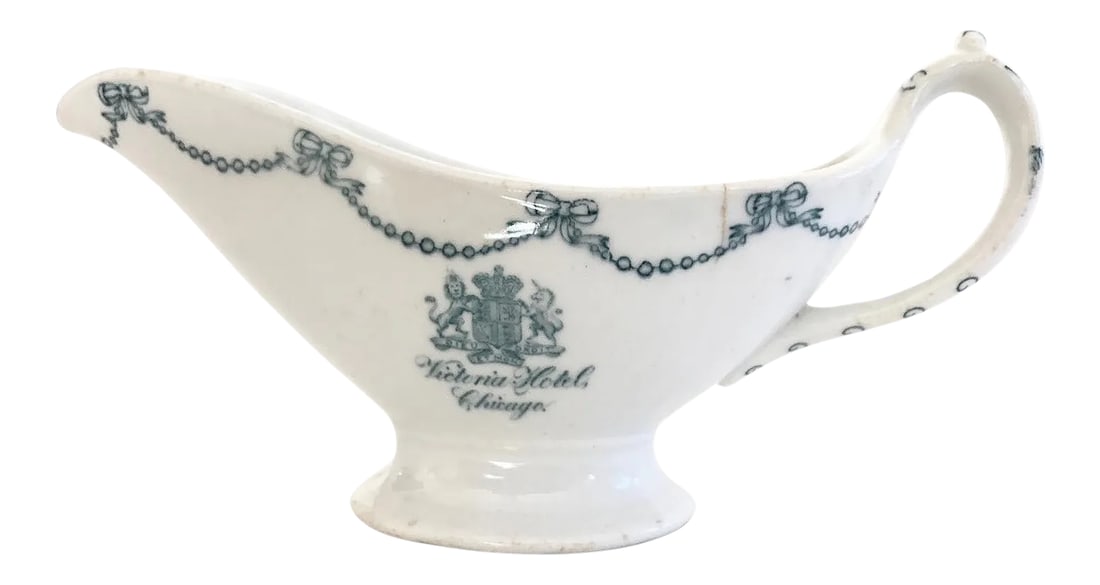 Antique Victoria Hotel Chicago Gravy Boat: A rare and unique piece of history. Victoria Hotel Chicago boat was made by New Castle China between 1901 and 1904. The Victoria Hotel in Chicago was built in 1901 and demolished in 1908. Some cracks 