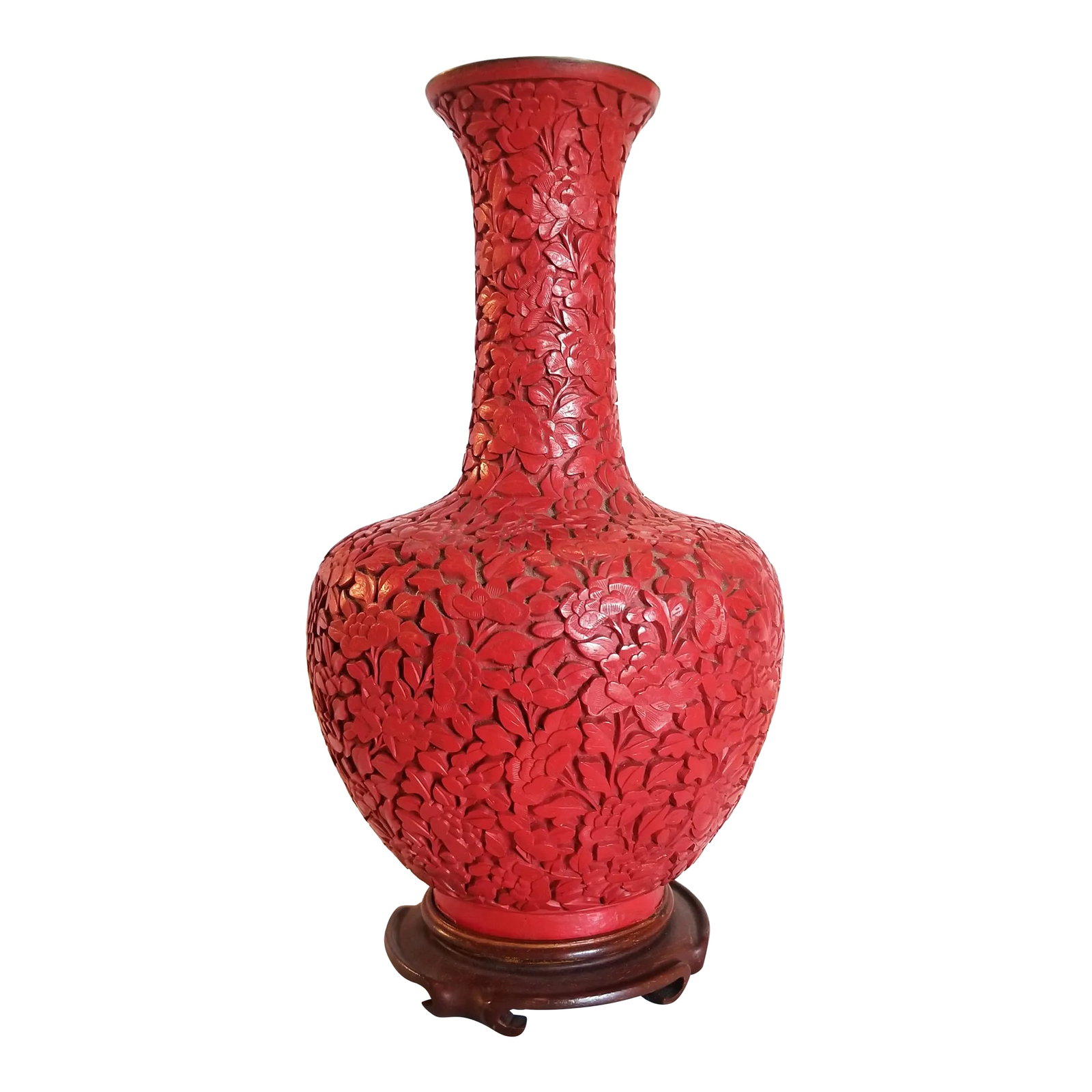 1950s Carved Red Cinnabar Vase: This vase will bring a beautiful burst of color to your home or office. It's very versatile, great for bookshelves or mantels. We can see it being an interesting centerpiece for a dining table, too!