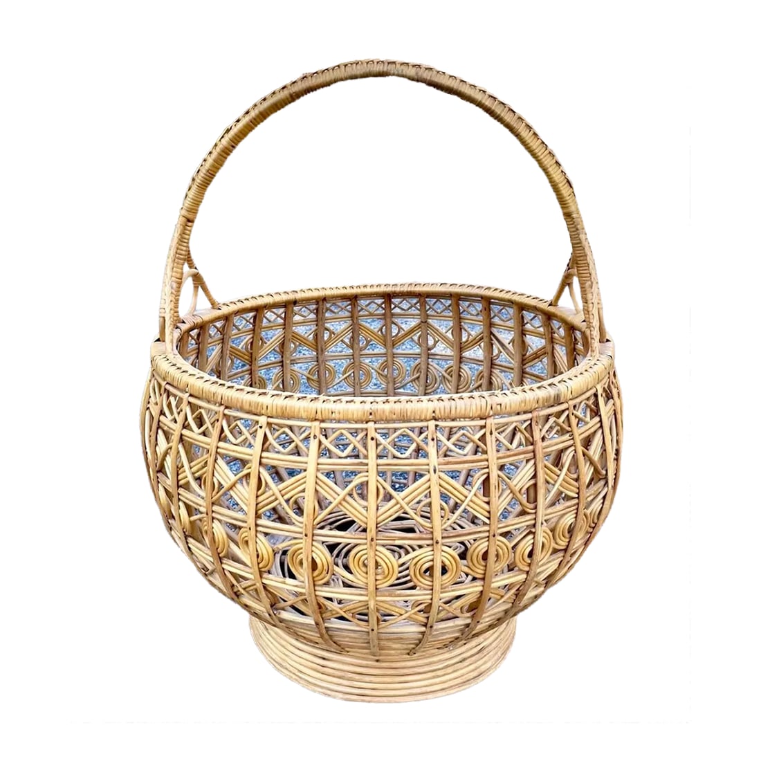 Mid 20th Century Vintage Large Woven Rattan Basket With Handle: A vintage woven rattan basket with handle. Highly detailed geometric patterns throughout with star pattern at center. Very good condition. Solid and sturdy. Condition: Alterations: Original Condition