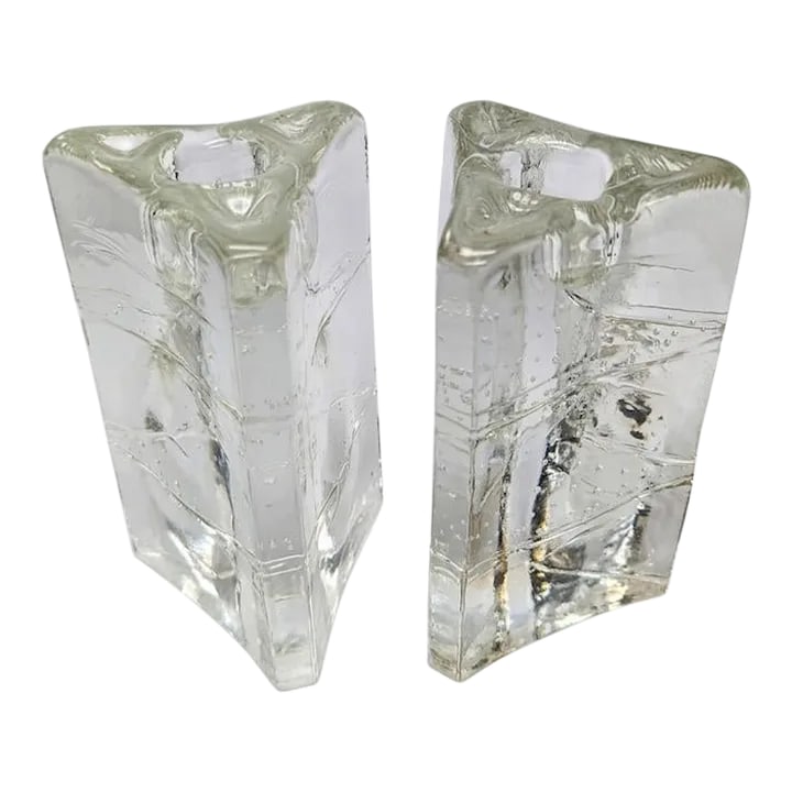 1980s Iittala "Arkipelago" Glass Candlestick Holders Designed by Timo Sarpaneva, a Pair: Offered are a pair of the triangular-shaped "Arkipelago" (archipelago) molded blown glass candle holders that have controlled bubbles originally designed by Timo Sarpaneva (b. 1926 - d. 2006) in the e