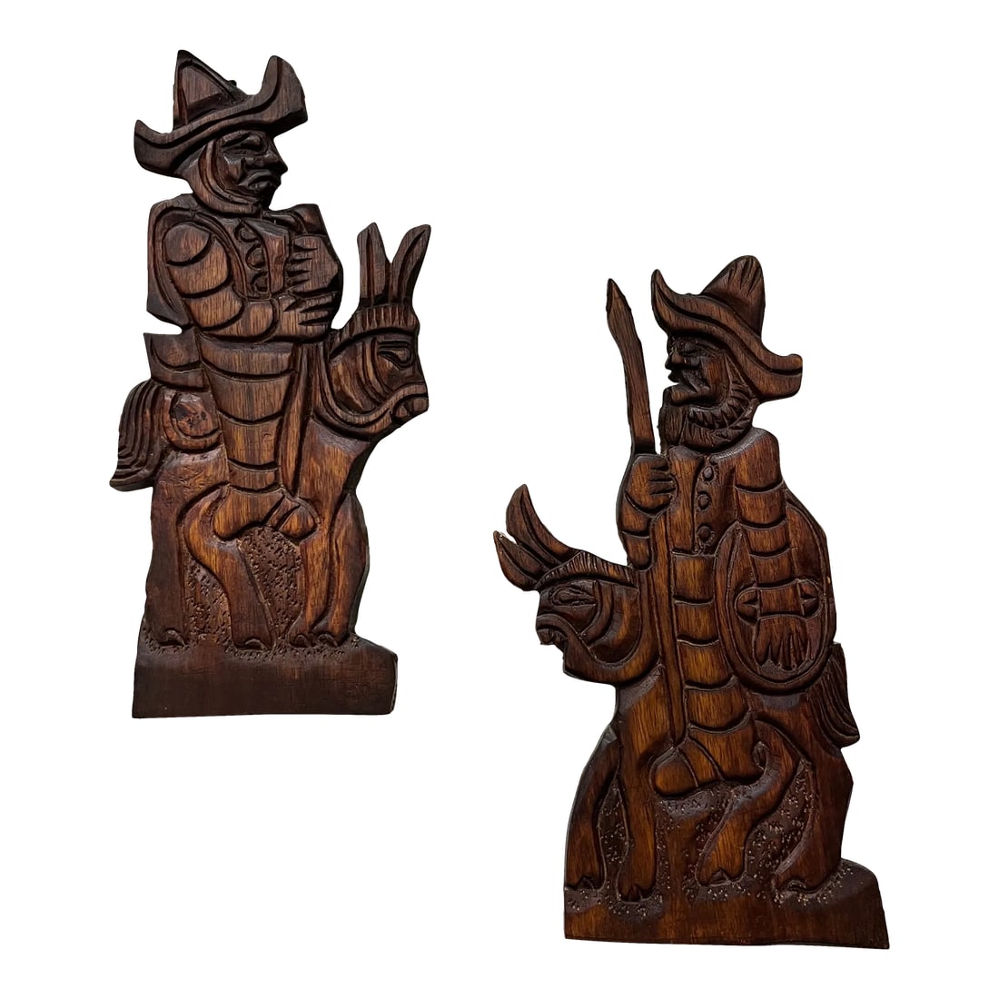 Mid Century Carved Wood Figure - Set of 2: Beautiful hand carved wall hanging. 2 wood wall hangings of Mexican people . On the back it is carved El Salvador. 16.5" x 8" and the other plank wood carving is 17.25" X 8". Condition: Alterations: