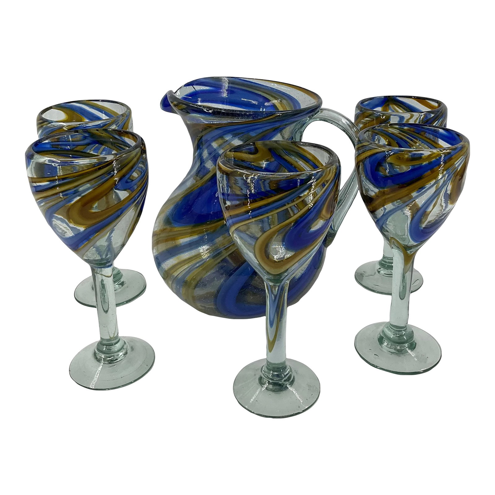 Mexican Reclye Hand Blown Glass Pitcher and 5 Goblets with Blue and Tan Swirl Design: The History of Recycled Hand-Blown Mexican Glass Mexico is the land of the master craftsman, the very first glass made in North America was produced in Puebla Mexico around 1535 to 1542 by artisans br