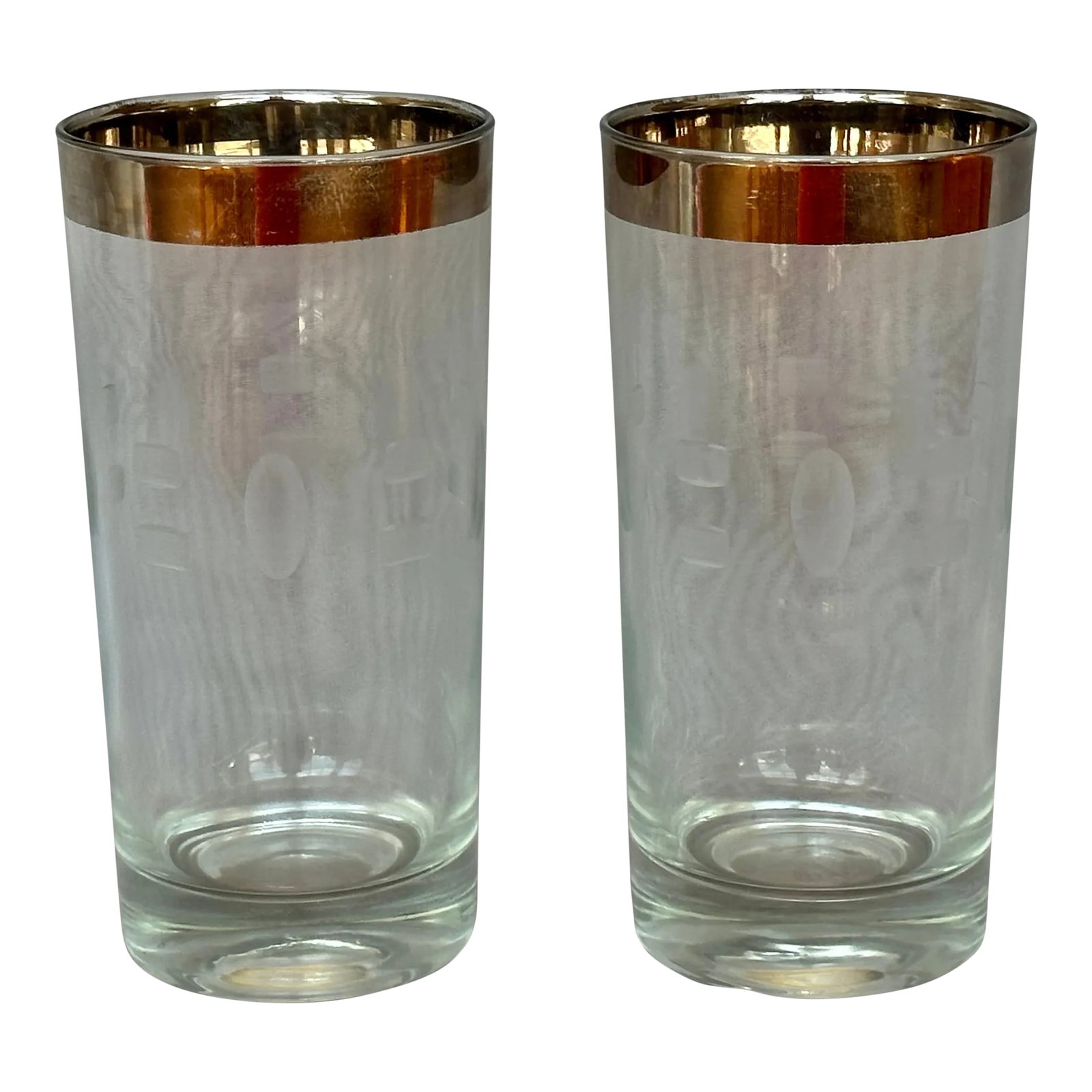 Mid Century Modern Highball Cocktail Glasses Set of 2: Add these classic Mid-Century Modern glasses to your barware collection. The vintage 1950s glassware can be used for highball cocktails, tall drinks, lemonade, or the beverage of your choice. The vint