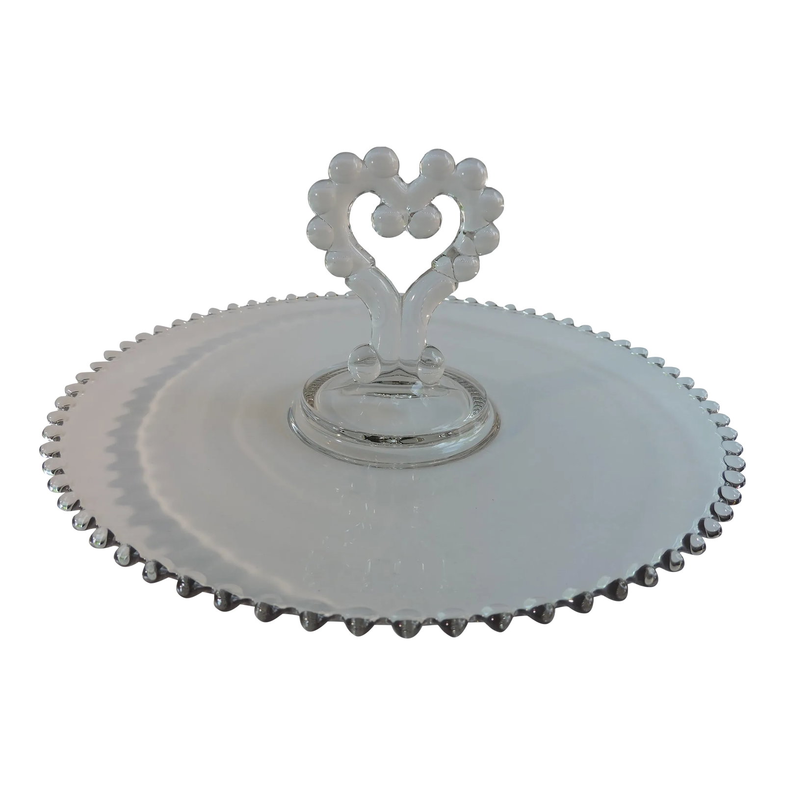 Vintage 1950's Imperial Glass Candlewick Heart Shaped Handled Serving Tray: This glass heart shaped handled serving tray was made by the Imperial Glass Co. and it is pressed glass pressed in their Candlewick Pattern that they produced from the 1940-70's. This serving tray is