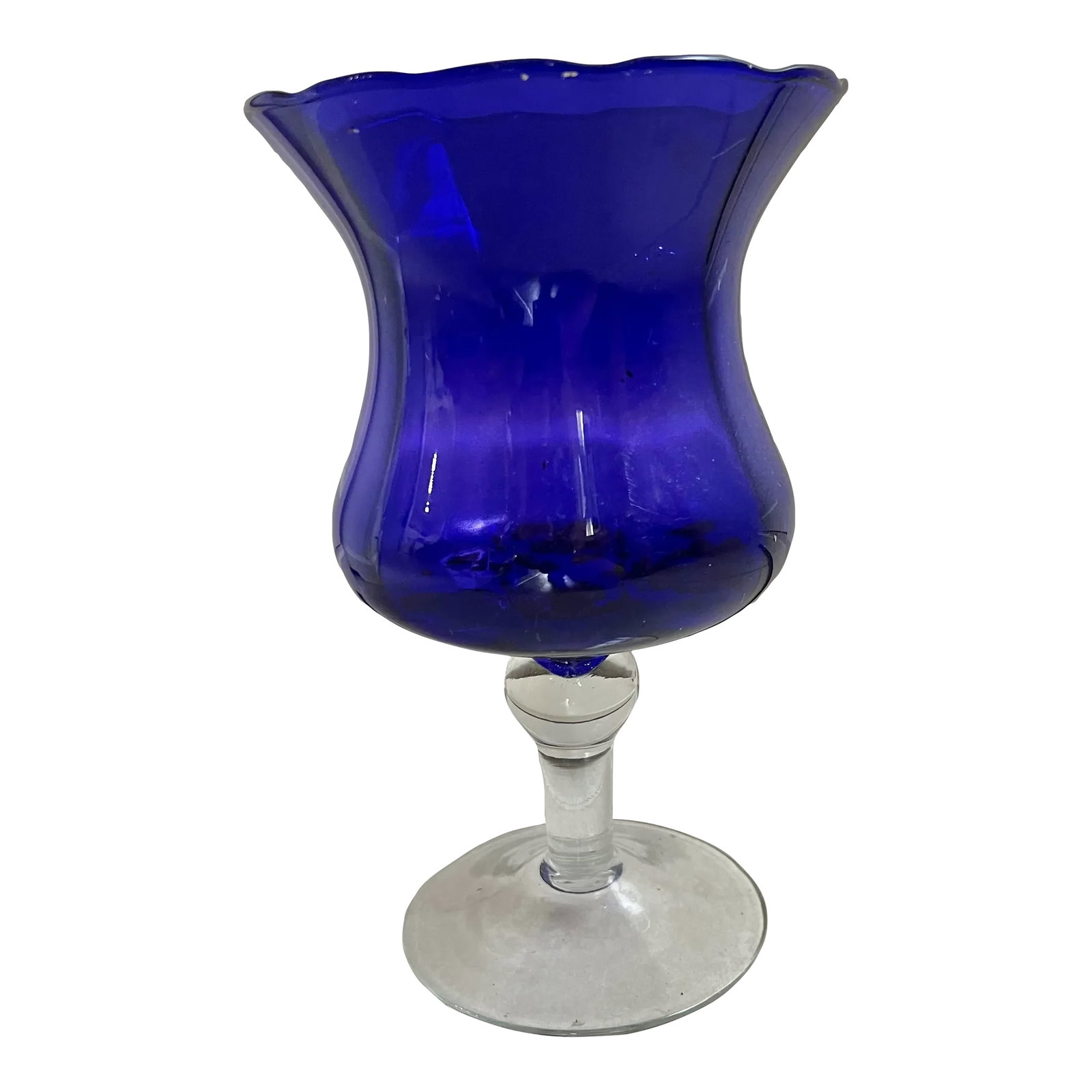 Vintage Blue Glass Pedestal Footed Vase: Beautiful blue - cobalt blue glass with clear pedestal base . Scalloped edge on top rim. Use for candles, flowers or any display items. Condition: Alterations: Original Condition Unaltered