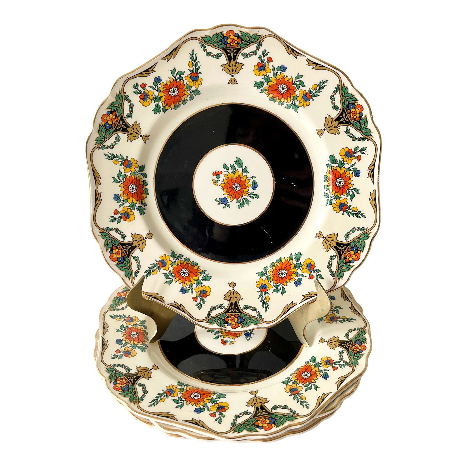 1920s-30s John Maddock & Sons "Minerva" Fruit & Floral Printed Ceramic Luncheon Plates- Set of 4: A set of four John Maddock & Sons luncheon plates in the pattern "Minerva", circa 1927. Made in England of ivory colored porcelain with orange, yellow, and blue flowers surrounded a black center