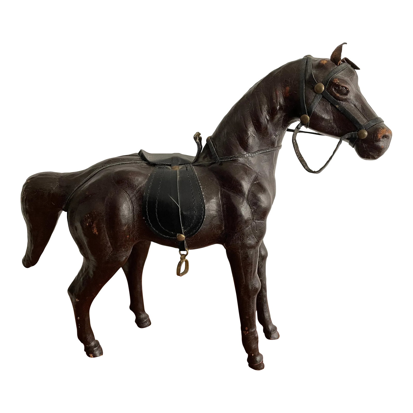 1930s Vintage Decorative Horse: This impressively realistic vintage horse is made of wood, and features leather accessories. Careful attention has been paid to showcase the horse's musculature and equipment, including saddle and sad