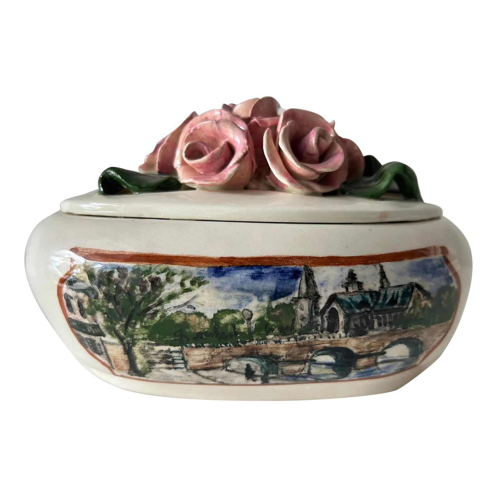 Antique Ceramic Lidded Cachepot With Imagery of Parisian Scenes & Sculpted Roses -Attributed to Capo: Beautiful, antique hand painted ceramic lidded jar or cachepot. Oval in shape with body featuring different depictions of Paris on each side. Lid is full with intricate pink roses and green leaves of