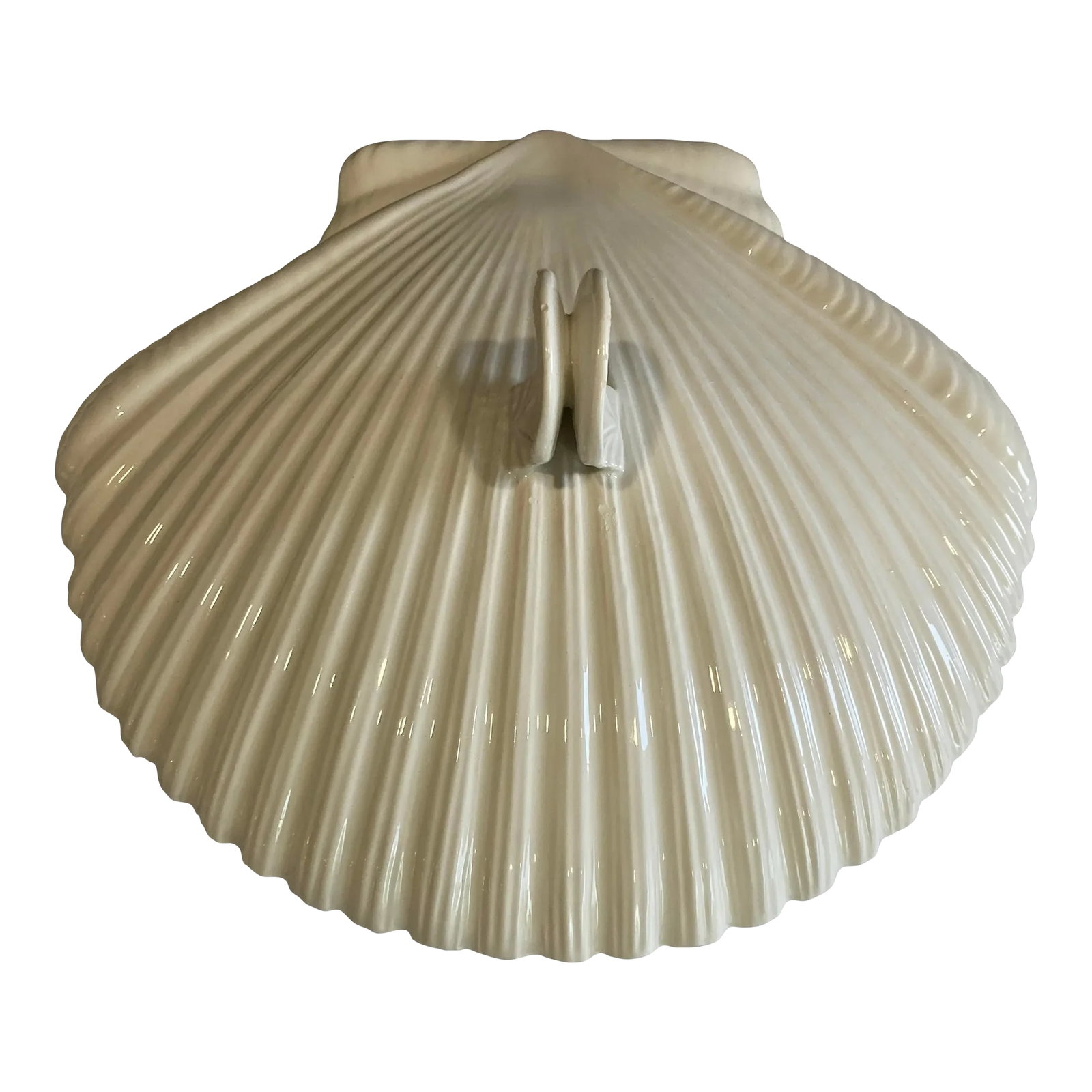 Italian Covered Shell Dish With Oyster Handle: Made in Italy, this stunning covered ceramic dish features a sculpted shell motif and a unique handle formed by two small oyster shells. The organic design and glossy glaze highlight its coastal