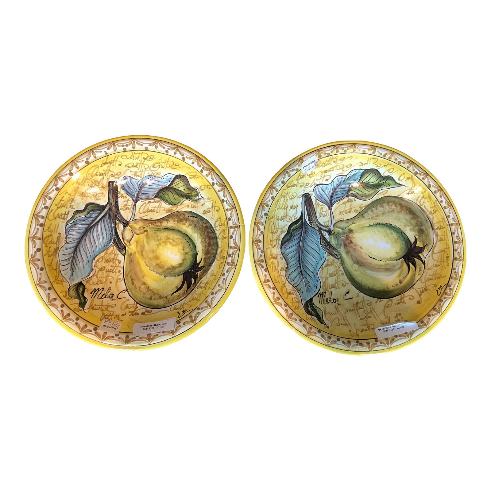 1990s Italian Hand Painted Round Ceramic Pear Wall Plates - a Pair: Hand Painted Round Ceramic Garden Veggies, pear Wall Plate. Signed by artist, Created in Italy. Condition: Alterations: Original Condition Unaltered Imperfections: Some Imperfections Condition Notes: 