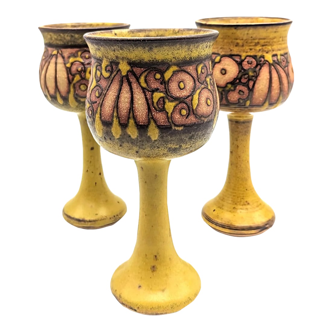 1970s Bonnie Staffer Studio Pottery Glazed Stoneware Goblets, Set of 3: Offered are three vintage 1970s handcrafted glazed and textured stoneware goblets from the studio of Bonnie Staffel in Charlevoix, Michigan. Wheel-thrown with solid post bases. Each goblet is