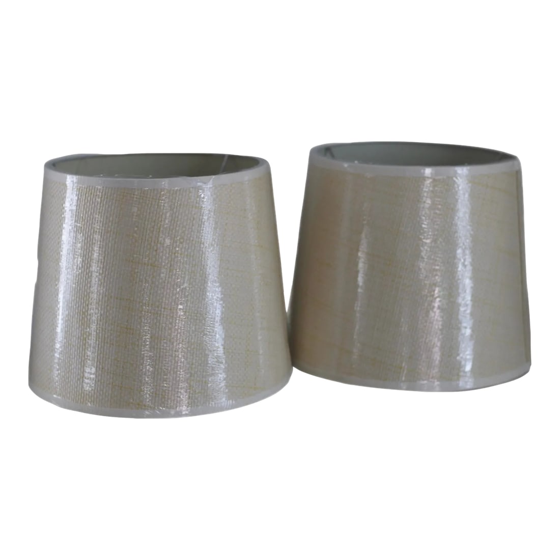 Pair of Woven Grasscloth Lampshades: Set of grasscloth lampshades- maker unkown 9" top diameter 11" bottom diameter 9" height Condition: Imperfections: No Imperfections Condition Notes: New lampshades wrapped in plastic Origin: United