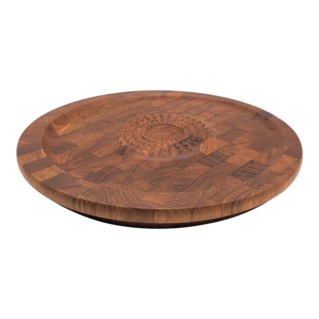 1960s Digsmed Staved Teak Wood Meat Tenderizing and Carving Board: Offered is a staved Teak wood carving and meat tenderizing board that multi-tasks as a cheese and charcuterie serving tray designed by Jens H. Quistgaard for Digsmed in the early 1960s and made in