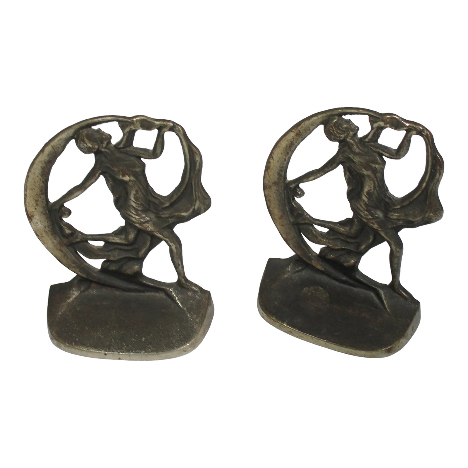 1930s = Art Deco Female Dancing Iron Bookends, Pair: Pair of antique iron art deco dancing female bookends. The figures are depicted in a balletic pose holding draped fabric with the moon on the side They were made by the Creation Co. 1930. These will