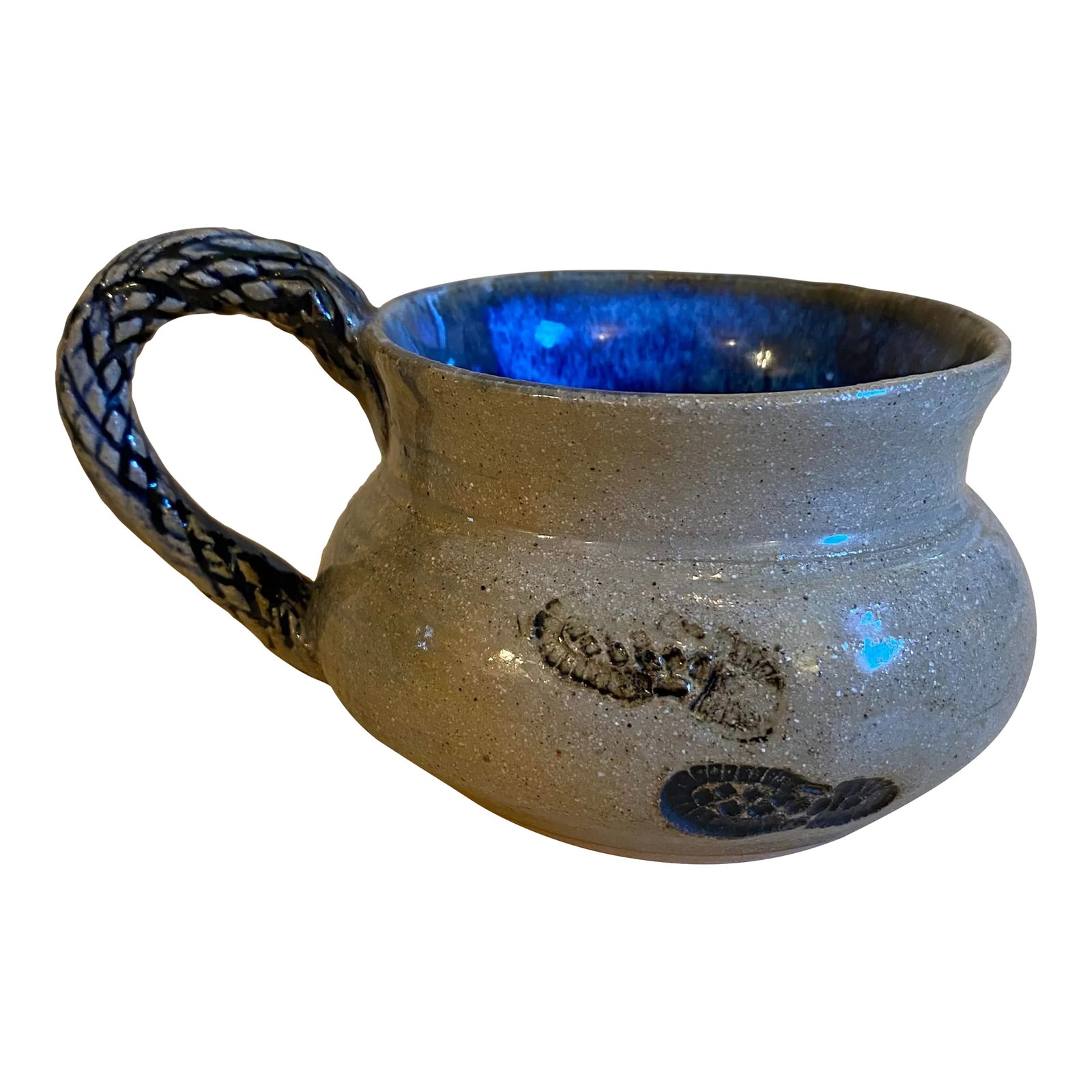 Hand Thrown Signed Gray & Blue Studio Art Pottery Foot Print Mug Basket Weave Design Handle: This is a hand thrown artist signed studio pottery mug with a textured basket weave design handle. It is a low profile mug. It is taupe gray and blue and features 2 imprints of hiking boot or work