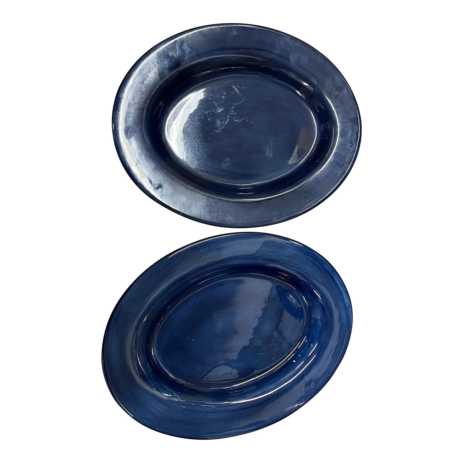 Vintage Blue Platters by Espana- Set of 2: Vintage handmade and painted large serving oval platters. Vibrant cobalt blue . Marked on the bottom Made by ESPANA. Set of 2 matching blue 18." Oval Platters. Condition: Alterations: Original