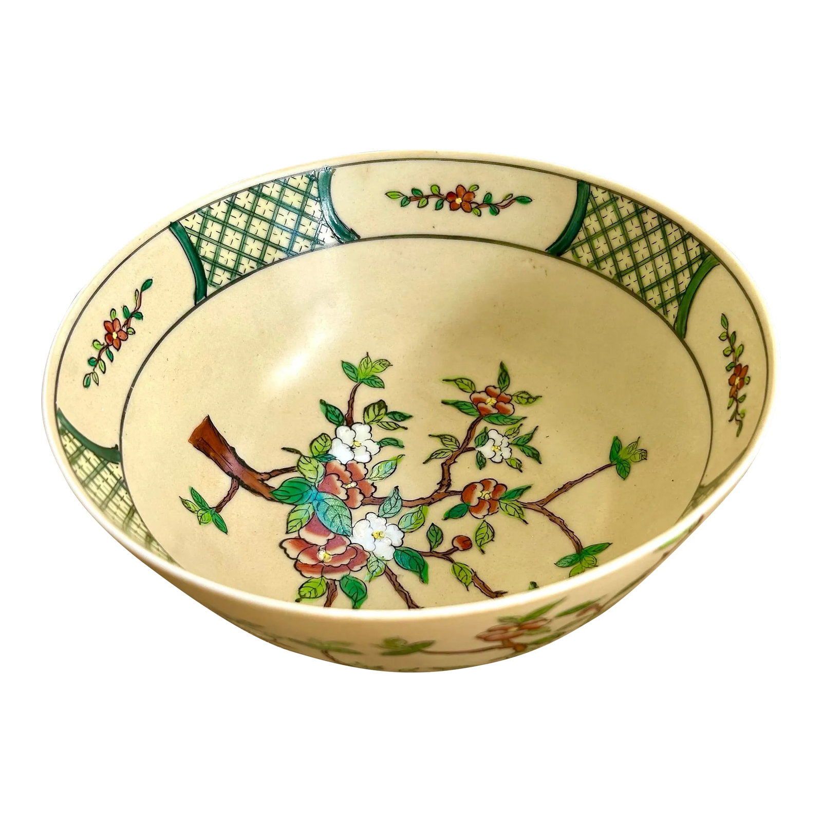 Chinese Apple Blossom Bowl: Apple blossom design on an antique white background. Very pretty color combination. The interior part of the bowl near the rim features a green lattice design along with cherry blossom flowers. The