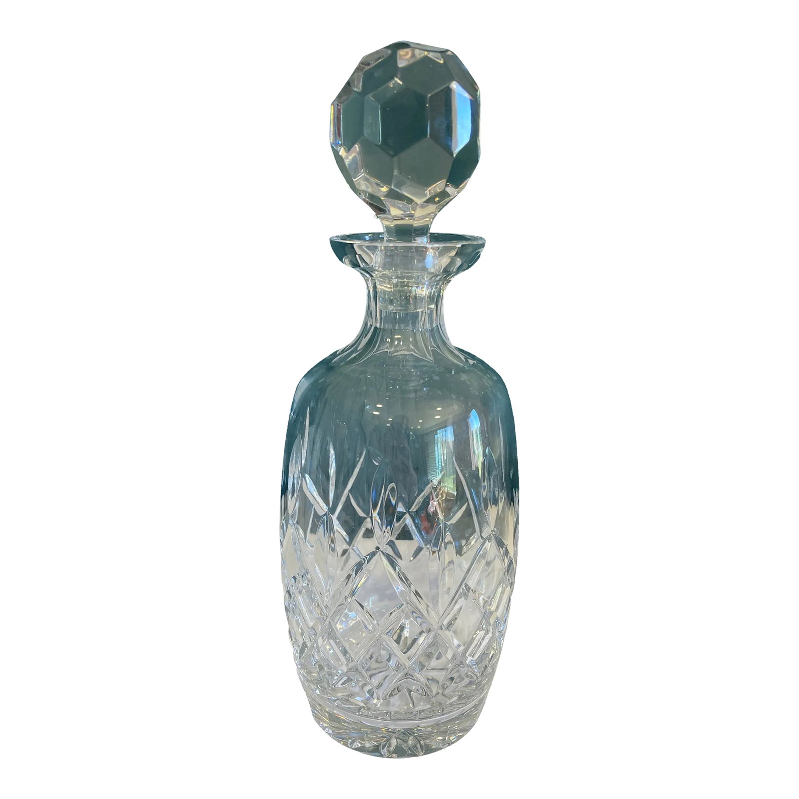 Vintage Cut Crystal Decanter With Faceted Stopper: This vintage cut crystal decanter features a diamond-patterned body and a large faceted stopper that adds both function and visual interest. The clear crystal construction reflects light beautifully, 