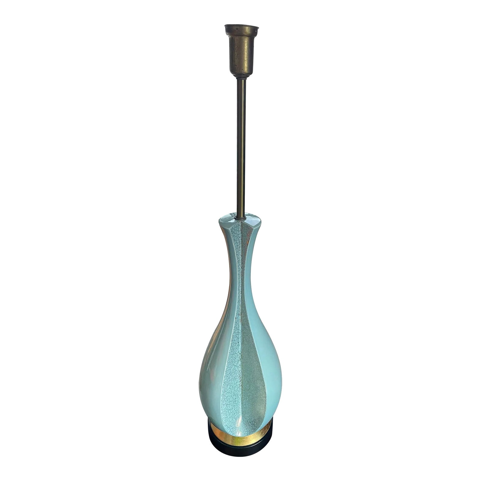 Mid 20th Century Rembrandt Ceramic Table Lamp: This unique floor lamp from the Rembrandt Lamp Company transports one back to the 1960's with it's curvy shape and inset wedge that is adorned with a unique golden crackle pattern, matching the gold