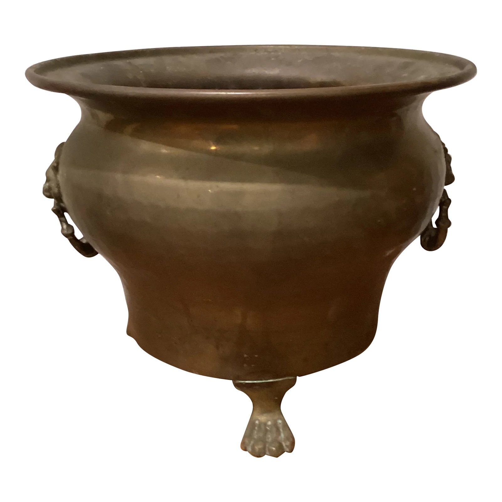 Early 20th Century Hand-Hammered Brass Jardiniere with Lion Heads: A rare and large-scaled Imperial Russian hand-hammered brass jardiniere with lion head mounts; Imperial Russia Stamp circa 1905 - 1915 . Rounded copper planter features 3 brass feet and 2 brass lions